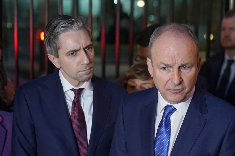 Fine Gael leader Simon Harris, left, and Fianna Fail’s Micheal Martin have said the Dail must elect a taoiseach and government on Thursday (PA)