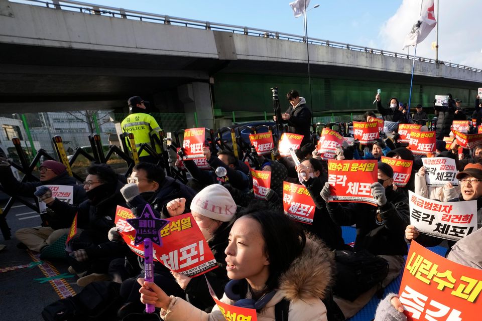 Demonstrators have called for the President to be detained (AP)