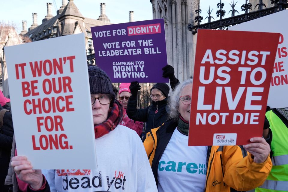 Proponents and opponents of the Terminally Ill Adults (End of Life) Bill outside Westminster on Friday. Pic: Stefan Rousseau/PA Wire