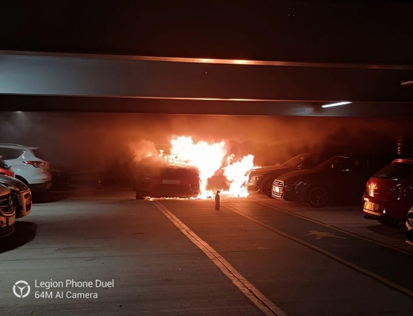 The vehicle on fire on the third floor of the car park (Bedfordshire Fire and Rescue/PA)