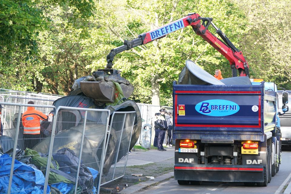 Tents were cleared from the canals in early morning operations (Brian Lawless/PA)