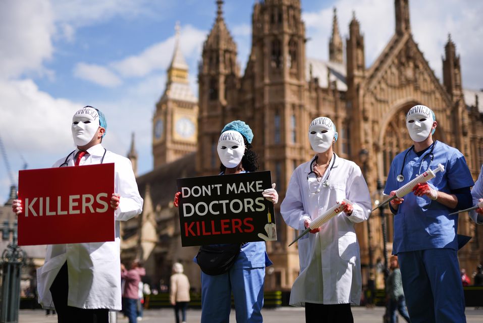 Campaigners against assisted dying protest outside Parliament (Jordan Pettitt/PA)