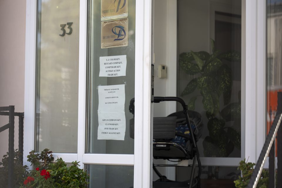 A sign featuring the names of several companies on the door of a house where a Hungarian company that allegedly manufactured pagers that exploded in Lebanon is headquartered in Budapest (Denes Erdos/AP)