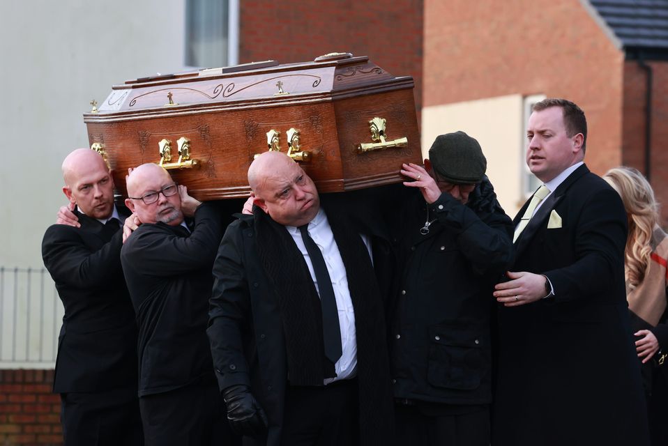 John George’s father Billy (front left), brother Darren (far left) and grandfather Joseph Hardy (front right) carried his coffin (Liam McBurney/PA)