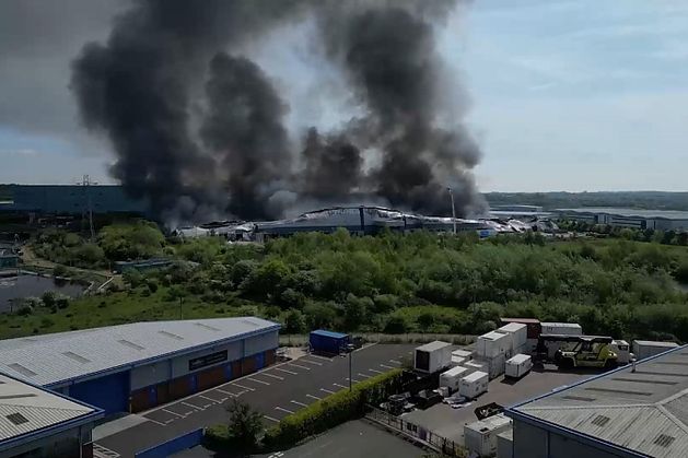 Cannock businesses evacuated as fire engulfs parcel centre on ...