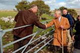 thumbnail: THE BURREN, IRELAND - MAY 19:  Prince Charles, Prince of Wales shakes hands with local farmer Oliver Nagle with his father Pat (R) looking on during his visit to The Burren, an ancient and dramatic stony outcrop famed for its rare plant life, biodiversity and archaeology, on the first day of his Royal visit to the Republic of Ireland on May 19, 2015 in County Clare, Ireland. The Prince of Wales and Duchess of Cornwall arrived in Ireland today for their four day visit to the Republic and Northern Ireland, the visit has been described by the British Embassy as another important step in promoting peace and reconciliation. (Photo by John Stillwell - WPA Pool/Getty Images)