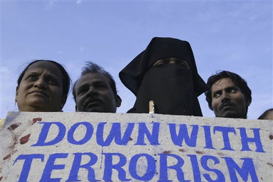 Indian Muslims,protest against terrorist attacks in Mumbai, as a placard reads " Kill terror not terrorist " in Ahmadabad, India, Saturday, Nov. 29, 2008. Indian commandos killed the last remaining gunmen holed up at a luxury Mumbai hotel Saturday, ending a 60-hour rampage through India's financial capital by suspected Islamic militants that killed people and rocked the nation. (AP Photo/Ajit Solanki)