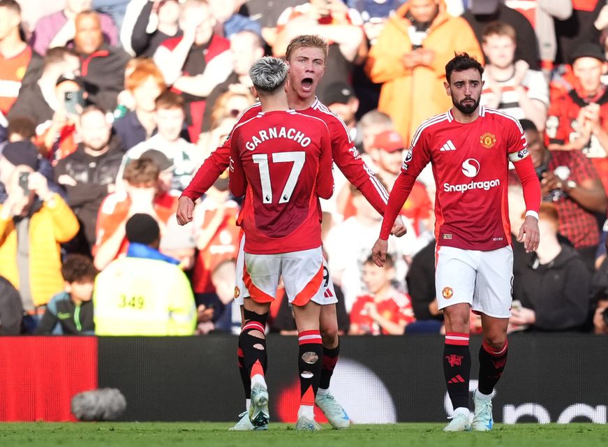 Rasmus Hojlund, centre, scored his first Premier League goal since May on Saturday (PA)