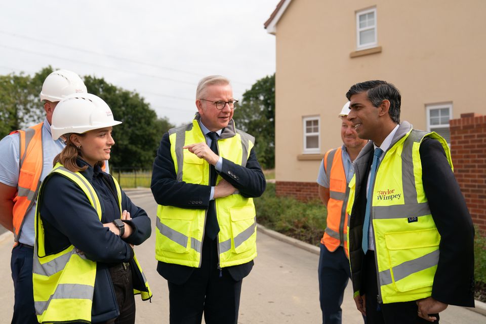 Rishi Sunak and Michael Gove watered down mandatory local housebuilding targets (Joe Giddens/PA)