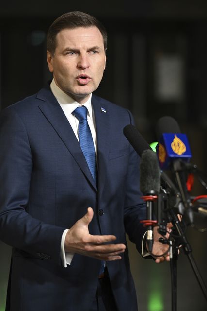 Estonia’s defence minister Hanno Pevkur speaks with the media as he arrives for a meeting of Nato defence ministers in Brussels (Harry Nakos/AP)