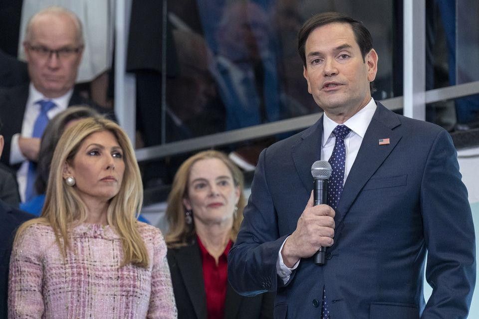 Secretary of State Marco Rubio speaks to State Department staff while next to his family including wife Jeanette Dousdebes Rubio in Washington (Jacquelyn Martin/AP)