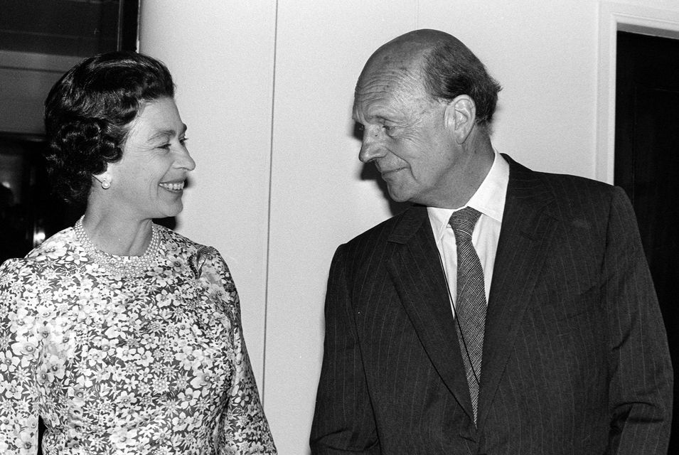 Queen Elizabeth II with Sir Martin Charteris who told her the full story of Blunt’s treachery (PA)