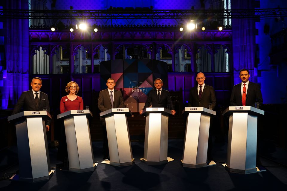The leaders of the five main parties at Holyrood all took part in the debate, which featured Scottish Liberal Democrat leader Alex Cole-Hamilton (left), Scottish Green Party co-leader Lorna Slater (second left), Scottish Conservative leader Douglas Ross (third from left), SNP leader John Swinney (second right) and Scottish Labour leader Anas Sarwar (right) with Debate Night host Stephen Jardine (third from right) moderating the live TV clash (Jane Barlow/PA)