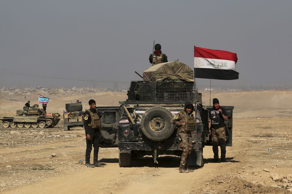 Iraqi special forces advance towards the western side of Mosul (AP/Khalid Mohammed)