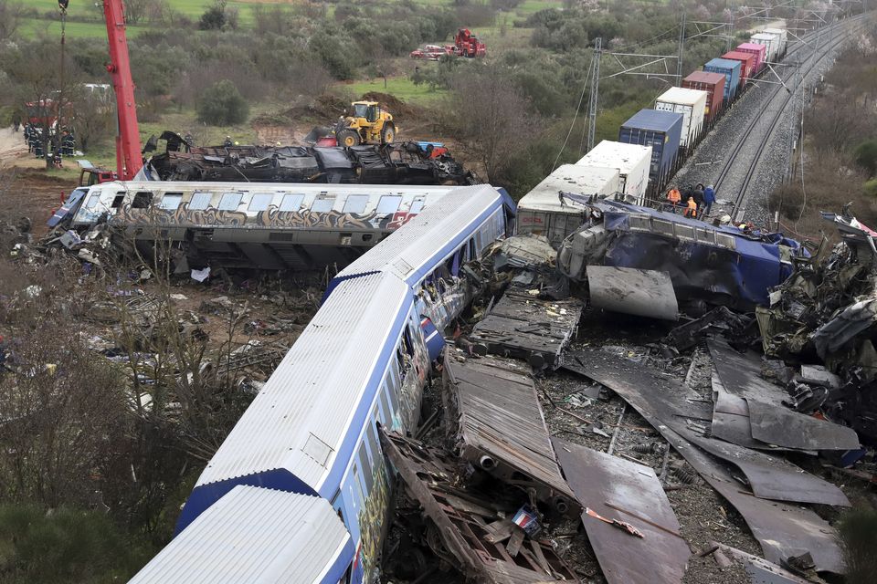 The disaster killed 57 people in Tempe, about 235 miles north of Athens (AP)