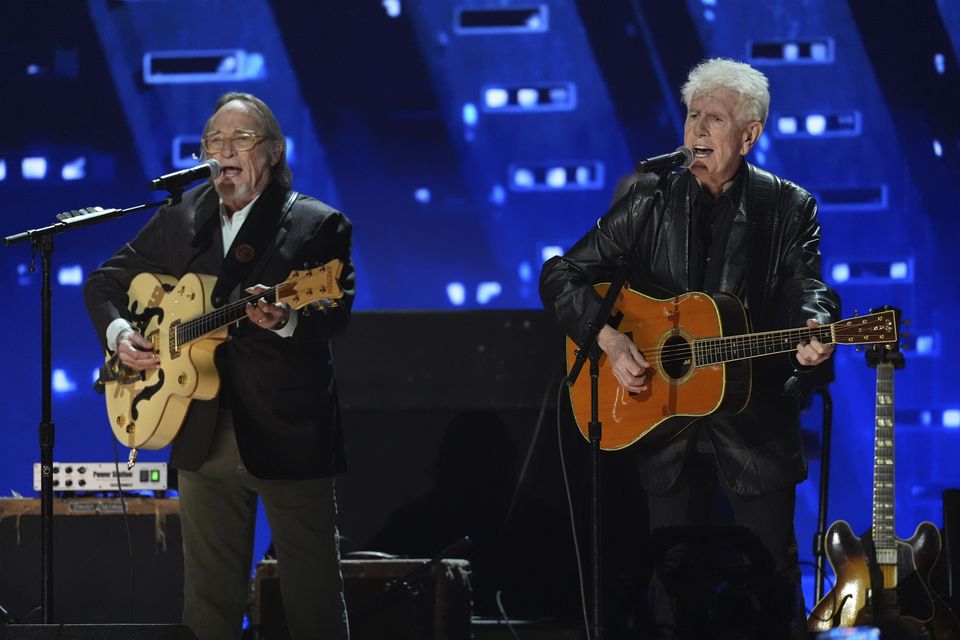 Stephen Stills, left, and Graham Nash perform during the FireAid benefit concert (AP/Chris Pizzello)