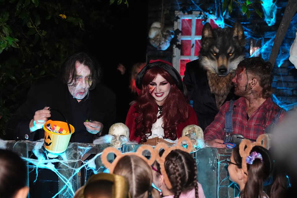 Jonathan Ross handing out sweets outside his house in north London (James Manning/PA)