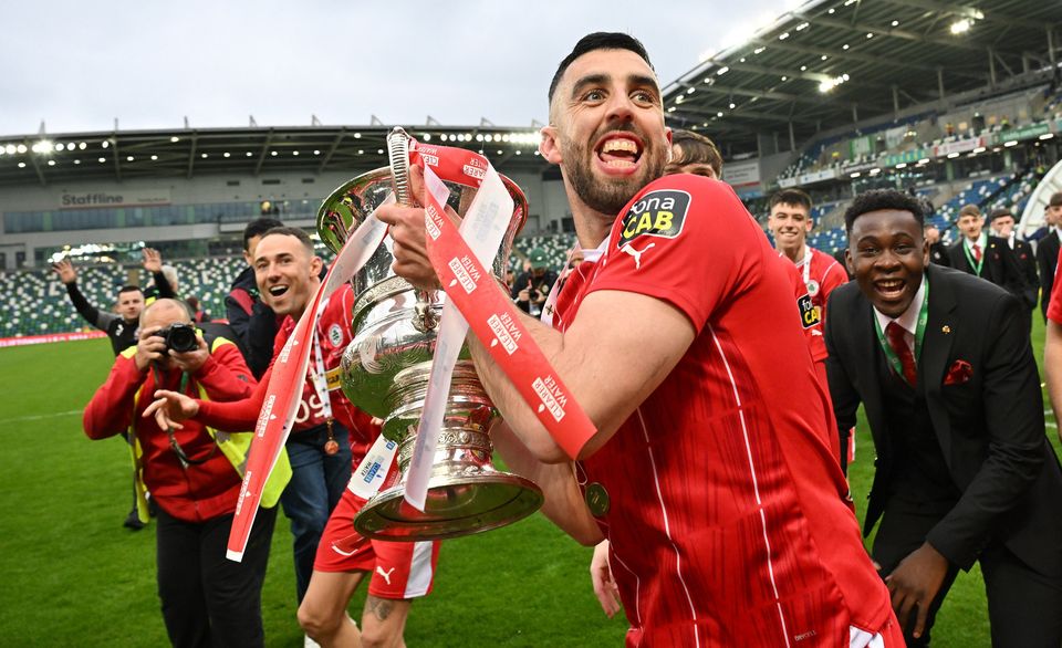 Cliftonville striker Joe Gormley savours his moment with the Irish Cup following the Final victory over Linfield