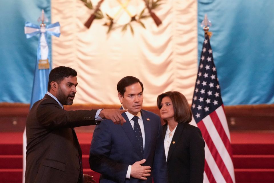 US Secretary of State Marco Rubio is directed to the meeting table after a photo opportunity with Guatemalan Vice President Karin Herrera, right, at the National Palace in Guatemala City (AP)