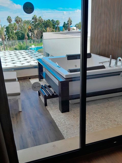 Some rooms at One Resort Premium come with their own balcony spa bath