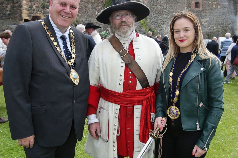 Press Eye - Belfast - Northern Ireland  - 13th July 2017 - 

Paul Reid, Mayor of Mid and East Antrim and  Deputy Mayor Cheryl Johnston, with Boyd Rankin who took part of  the re-enactment of the Siege of Carrickfergus Castle and the landing of King William at Castle Green, Carrickfergus. The event included re-enactment groups from across the Northern Oteland, all dressed in period costume followed by a Pageantry parade to meet King William upon his landing at Carrick Harbour. 

Photo by Kelvin Boyes / Press Eye.