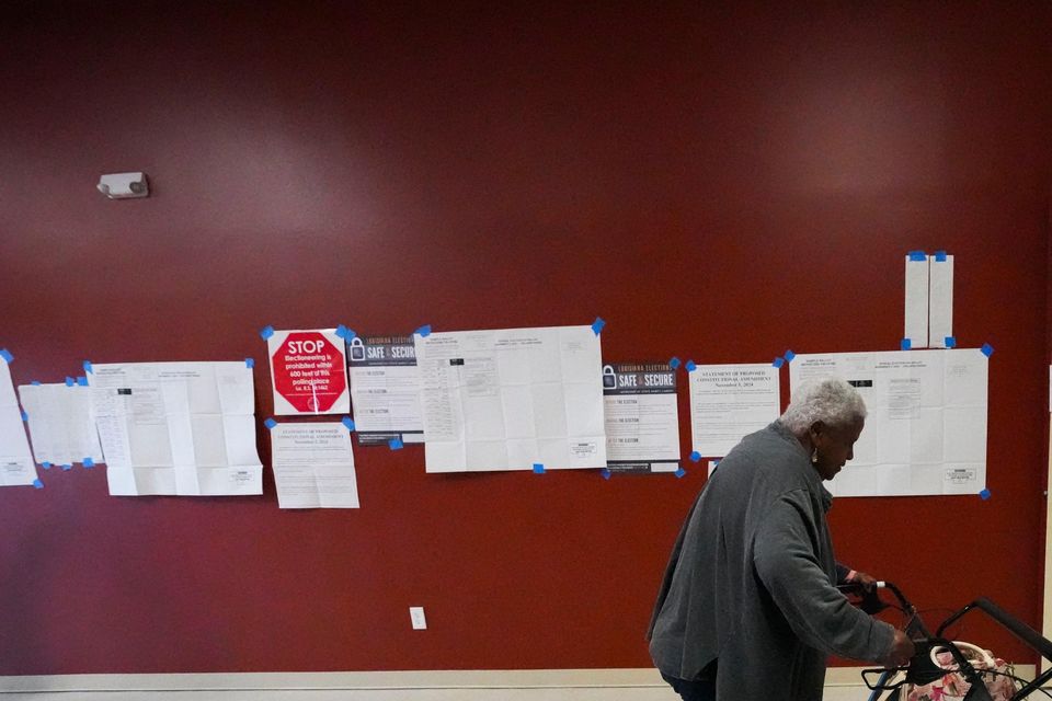 Alfredia Washington arrives to vote at the Household of Faith Church in New Orleans on Election Day (Gerald Herbert/AP)