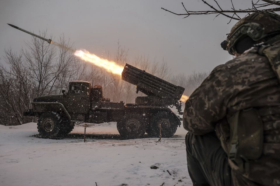 Ukrainian servicemen fire an MRLS BM-21 Grad towards Russian army positions in the Donetsk region (Oleg Petrasiuk/Ukraine’s 24th Mechanised Brigade/AP)