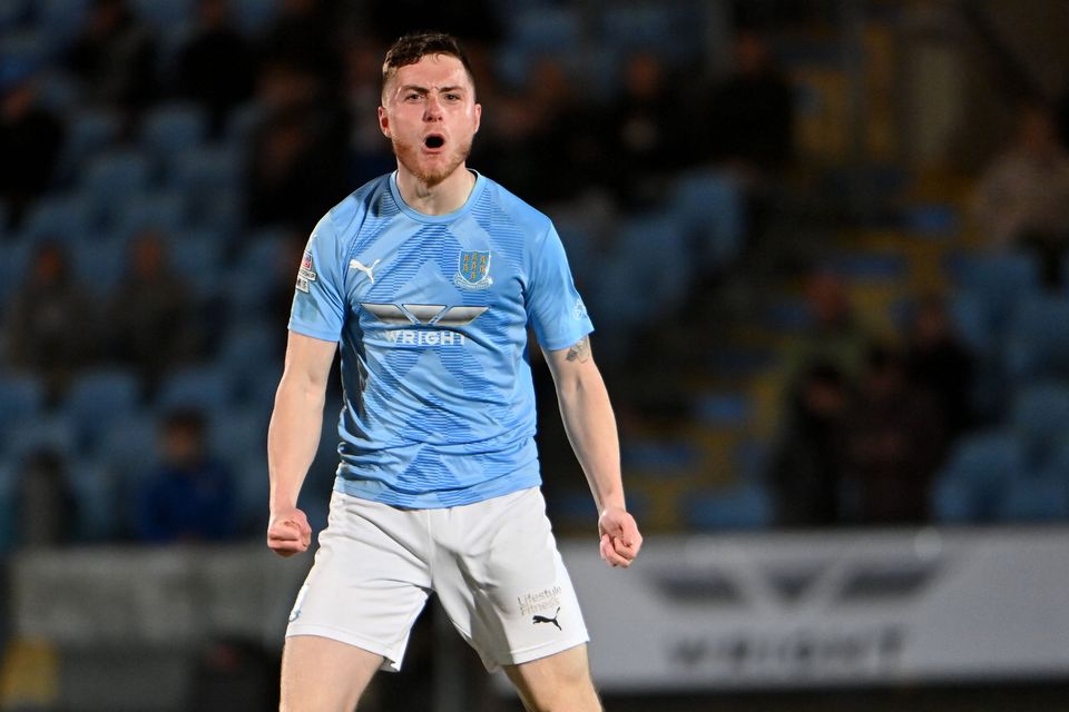 Ballymena United's Calvin McCurry celebrates the goal that kept his side in the Premiership.