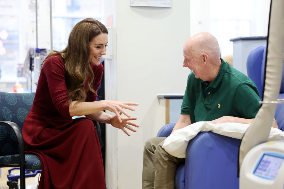 Kate talks with Kerr Melia, who has gastroesophageal cancer, in the treatment room (Chris Jackson/PA)