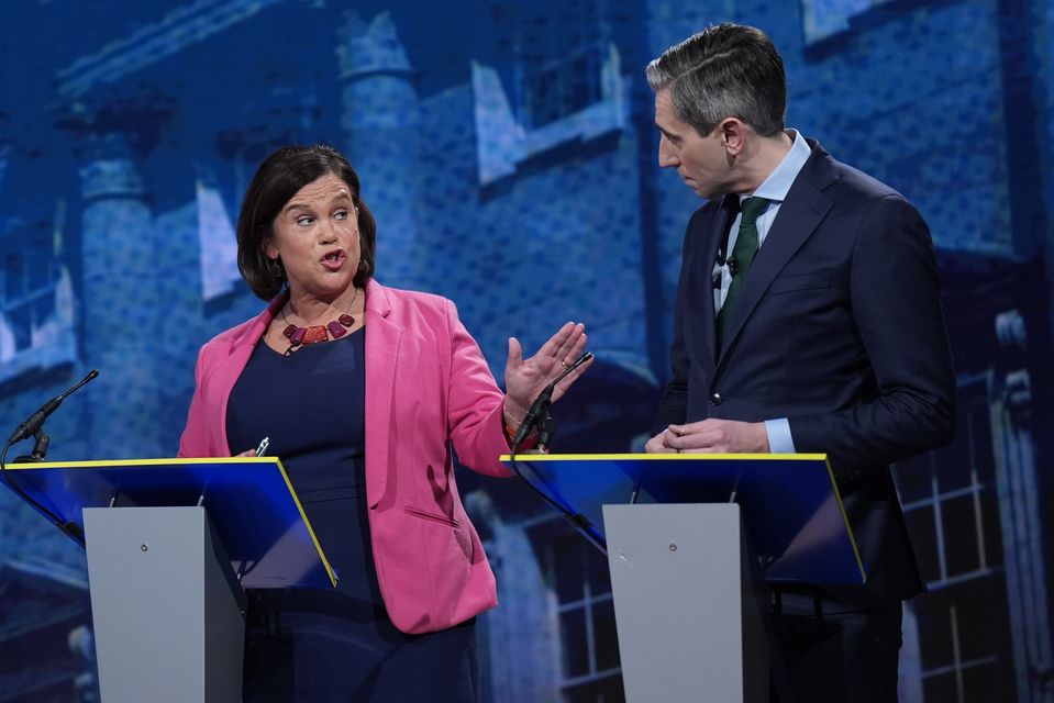 Sinn Fein leader Mary Lou McDonald and Taoiseach and Fine Gael leader Simon Harris (Niall Carson/PA)