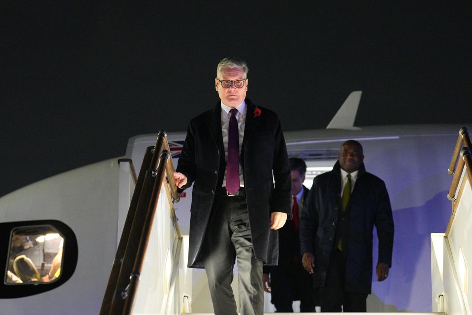 Prime Minister Sir Keir Starmer and Foreign Secretary David Lammy arriving at Heydar Aliyev International Airport to attend the Cop29 climate summit in Baku, Azerbaijan (Carl Court/PA)