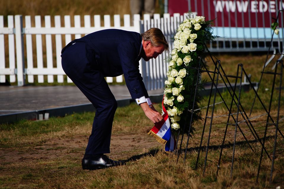 King Willem-Alexander of the Netherlands placing a wreath (Ben Birchall/PA)