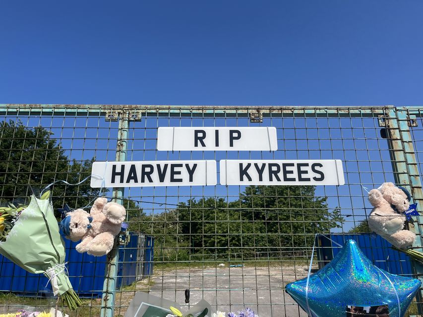 Floral tributes were left to the two boys following the rioting (Rod Minchin/PA Wire)