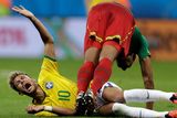 thumbnail: Brazil's Neymar cries in pain after colliding with Cameroon's Joel Matip during the group A World Cup soccer match between Cameroon and Brazil at the Estadio Nacional in Brasilia, Brazil, Monday, June 23, 2014. (AP Photo/Andre Penner)