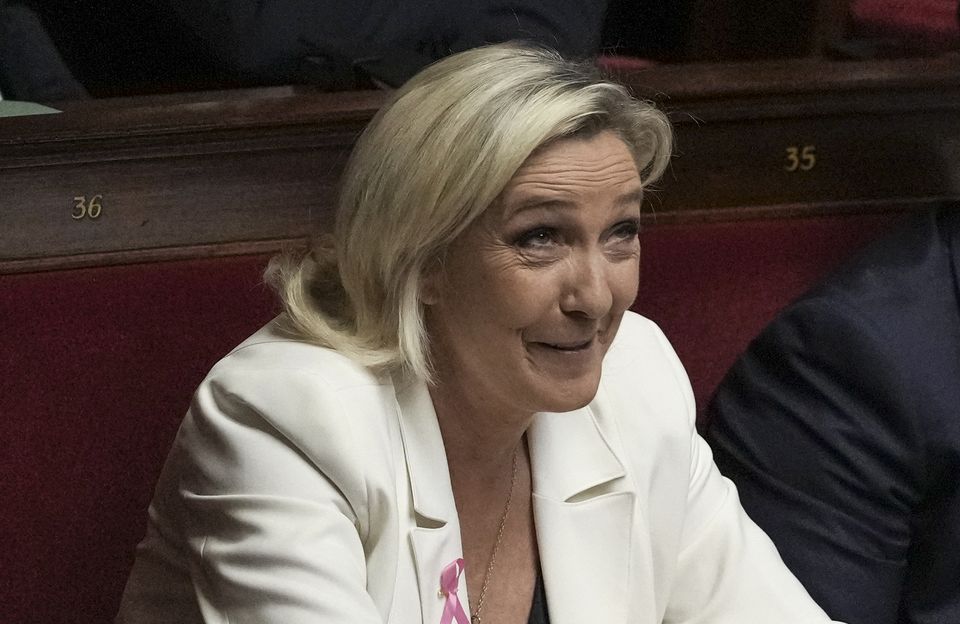 Far-right National Rally leader Marine Le Pen said she has decided to ‘give a chance’ to the government (Thibault Camus/AP)