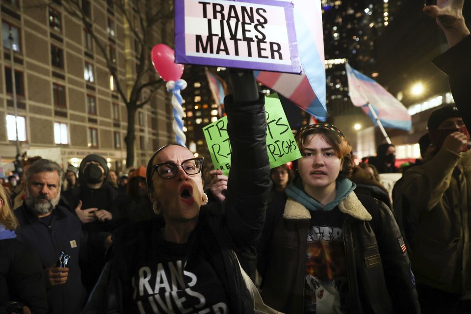 Protesters march during a rally demanding that NYU Langone commit to providing gender-affirming care for transgender youth (Heather Khalifa/AP)