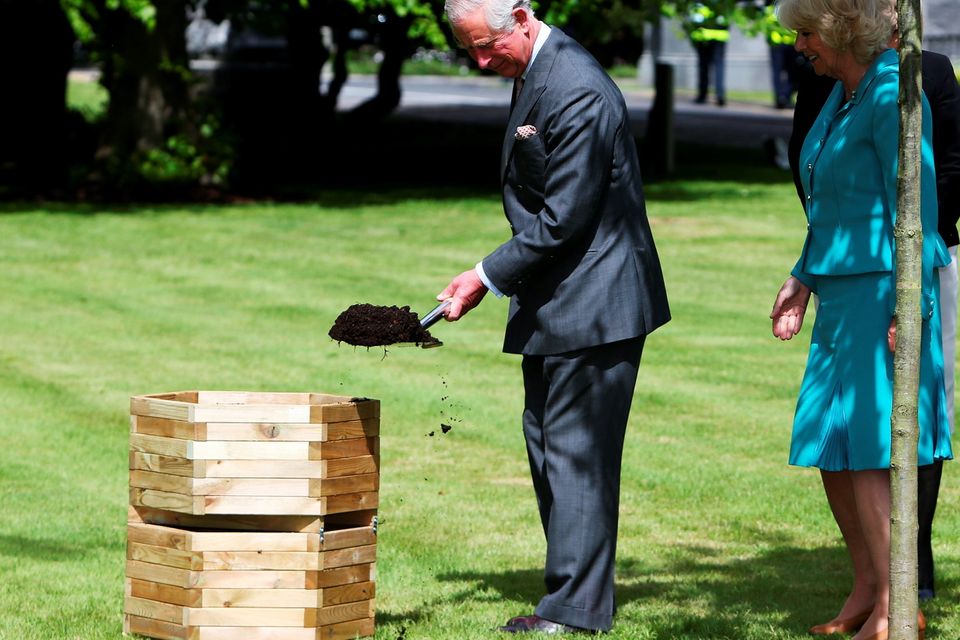 GALWAY, IRELAND - MAY 19:  Prince Charles, Prince Of Wales and Camilla, Duchess of Cornwall plant an oak tree at a welcome reception at National University of Ireland on May 19, 2015 in Galway, Ireland. The Prince of Wales and Duchess of Cornwall arrived in Ireland today for their four day visit to the Republic and Northern Ireland, the visit has been described by the British Embassy as another important step in promoting peace and reconciliation. (Photo by Brian Lawless - WPA Pool/Getty Images)