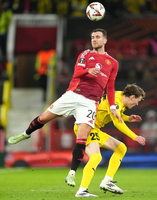 Diogo Dalot replaced Tyrell Malacia at half-time of Thursday’s match against Bodo/Glimt (Martin Rickett/PA)