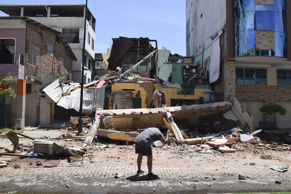 Buildings collapsed during the earthquake in Machala, Ecuador (Jhonny Crespo/AP)