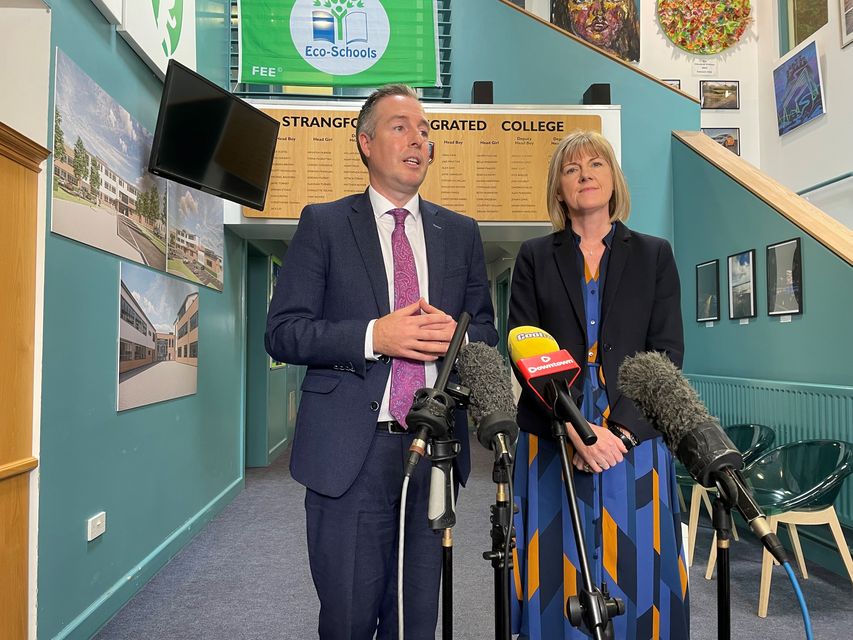 Education Minister Paul Givan and school principal Clare Foster at Strangford Integrated College (Jonathan McCambridge/PA)