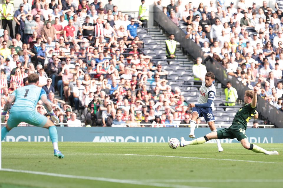 Brennan Johnson (centre) puts Tottenham ahead (Steven Paston/PA)