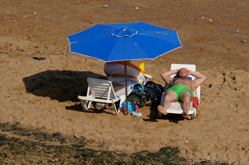 The Lib Dems argue cutting VAT on high-factor sun cream will increase its use (Gareth Fuller/PA)