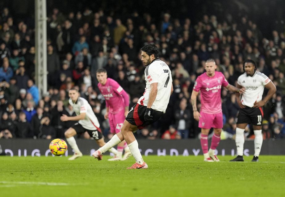 Raul Jimenez slotted in two penalties to help earn Fulham a point (Andrew Matthews/PA)