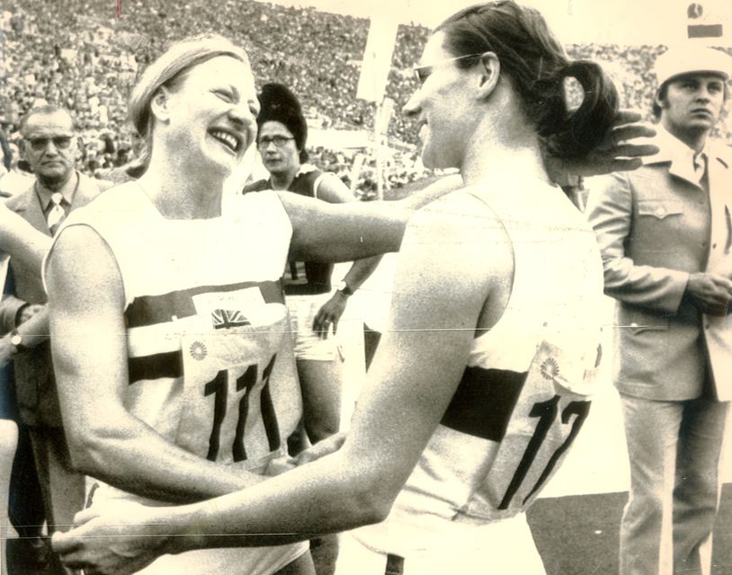 Great Britain's Mary Peters is congratulated on her Olympic Gold Medal win by West Germany's Heide Rosendhal, who won the Silver Medal.