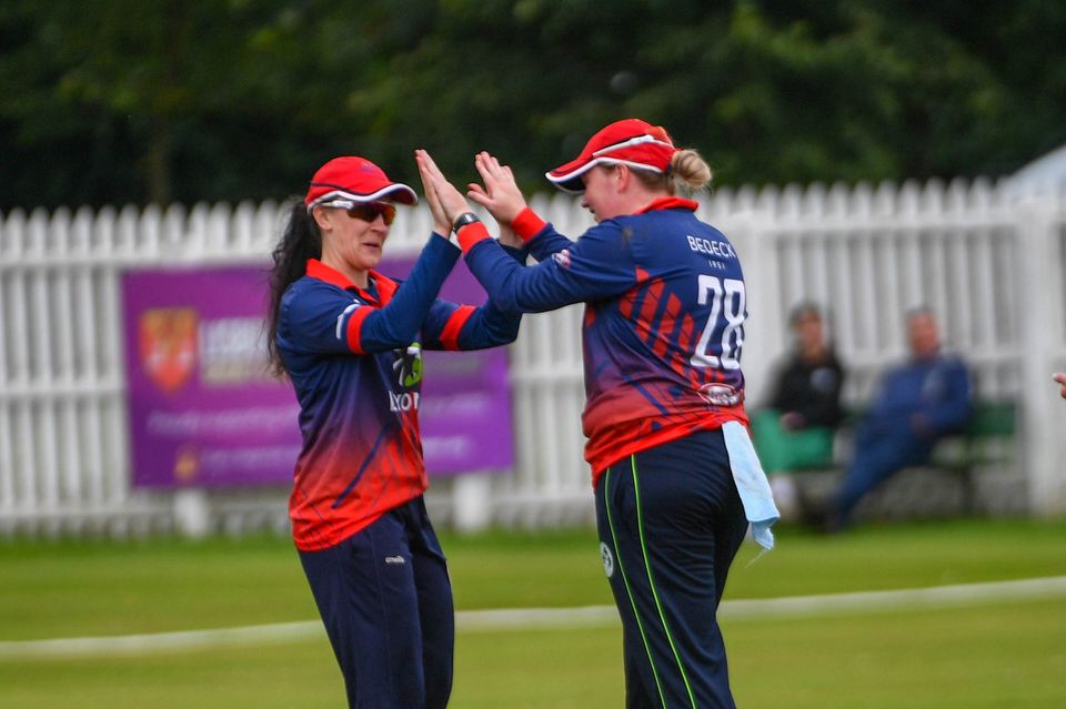 Charlotte Lyons of Waringstown takes a wicket during the Gallagher Women's Challenge Cup Final against Holywood