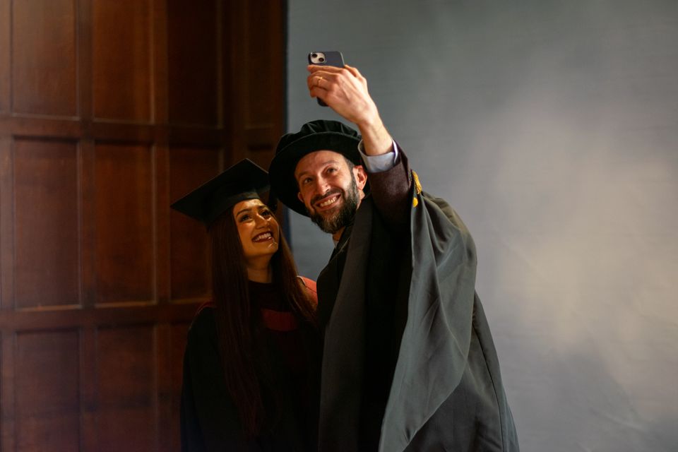 Gurvin Chopra poses for a selfie with Professor Michele Acuto from the University of Bristol (University of Bristol/PA)