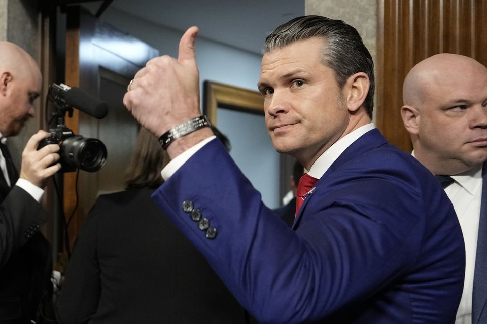 Pete Hegseth gives a thumbs-up at the completion of his confirmation hearing before the Senate Armed Services Committee at the Capitol in Washington (Ben Curtis/AP)