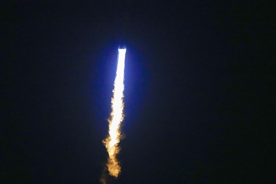 The New Glenn rocket heads into space after a successful lift-off (John Raoux/AP)