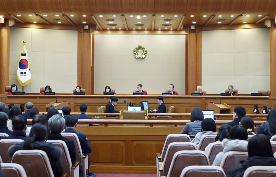 South Korea’s Constitutional Court’s judges sit for the first formal hearing of a trial on the validity of president Yoon Suk Yeol’s impeachment by the National Assembly at the constitutional court of Korea in Seoul (Kim Min-Hee/Pool Photo/AP)