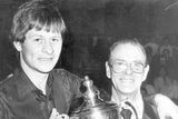 thumbnail: Alex Higgins.  Snooker Legend.  Alex Higgins senior pictured with his son after Alex had regained the Smithwick's Irish Professional Snooker Championship in Maysfield Leisure Centre.  Alex won the final against reigning champion Dennis Taylor by 16 frames to 11.